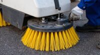minimize sweeper brush wear